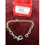 Silver bracelet.