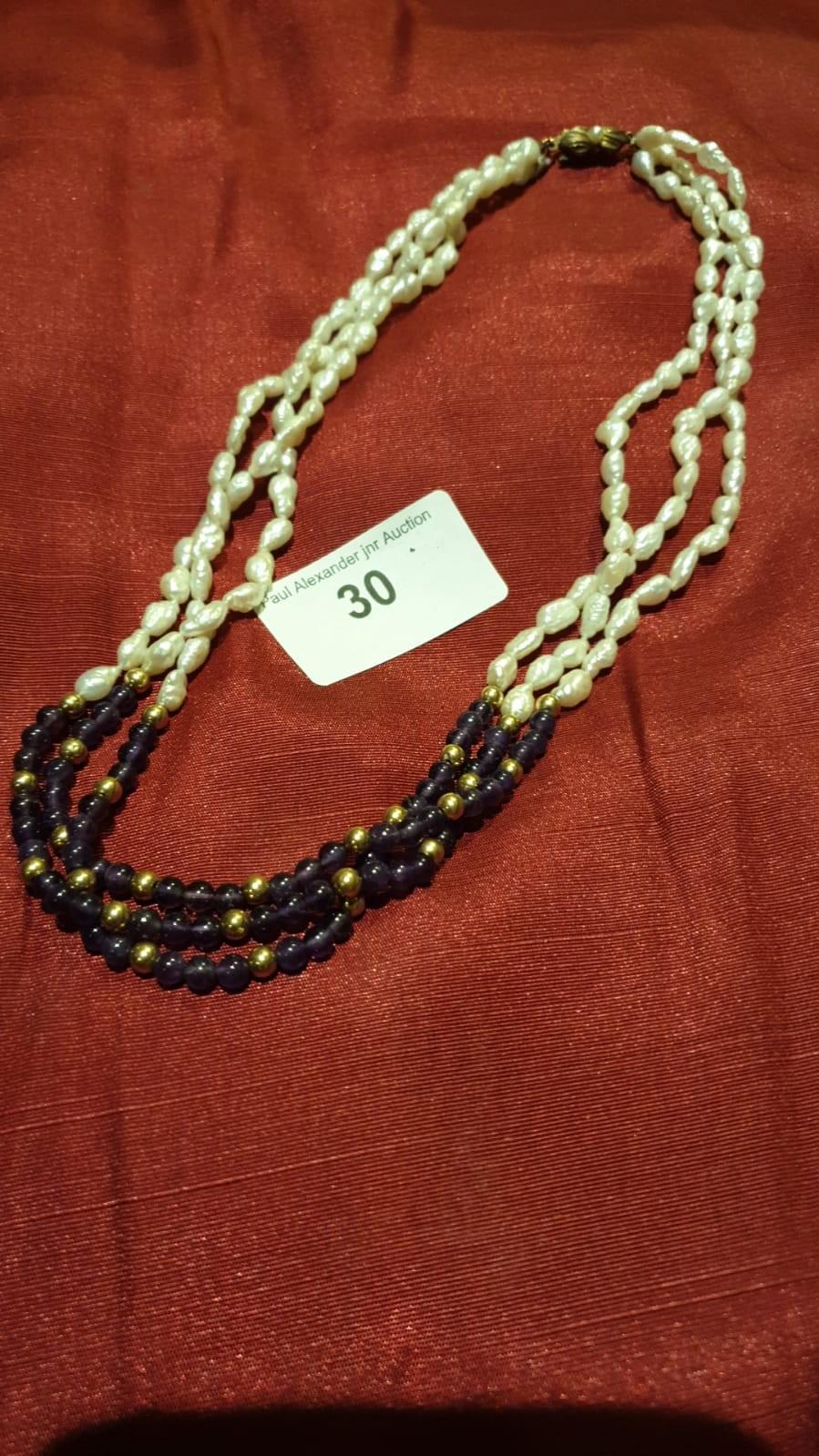 Fresh water pearl purple and gold beaded necklace.