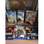 Shelf of playstation 2 games .