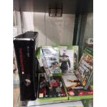 Xbox 360 console no leads with games .