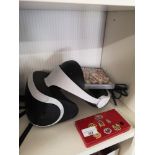 Nintendo ds with game together with vr head set .