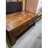 Modern heavy coffee table with 3 drawer storage.
