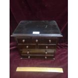 1900s aprentise chest of drawers with handles.