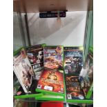 Shelf of Xbox original games.