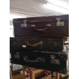 lot of 3 vintage suit cases.