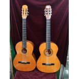 2 almeria acoustic guitars .