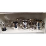 Shelf of silver plated wares etc .