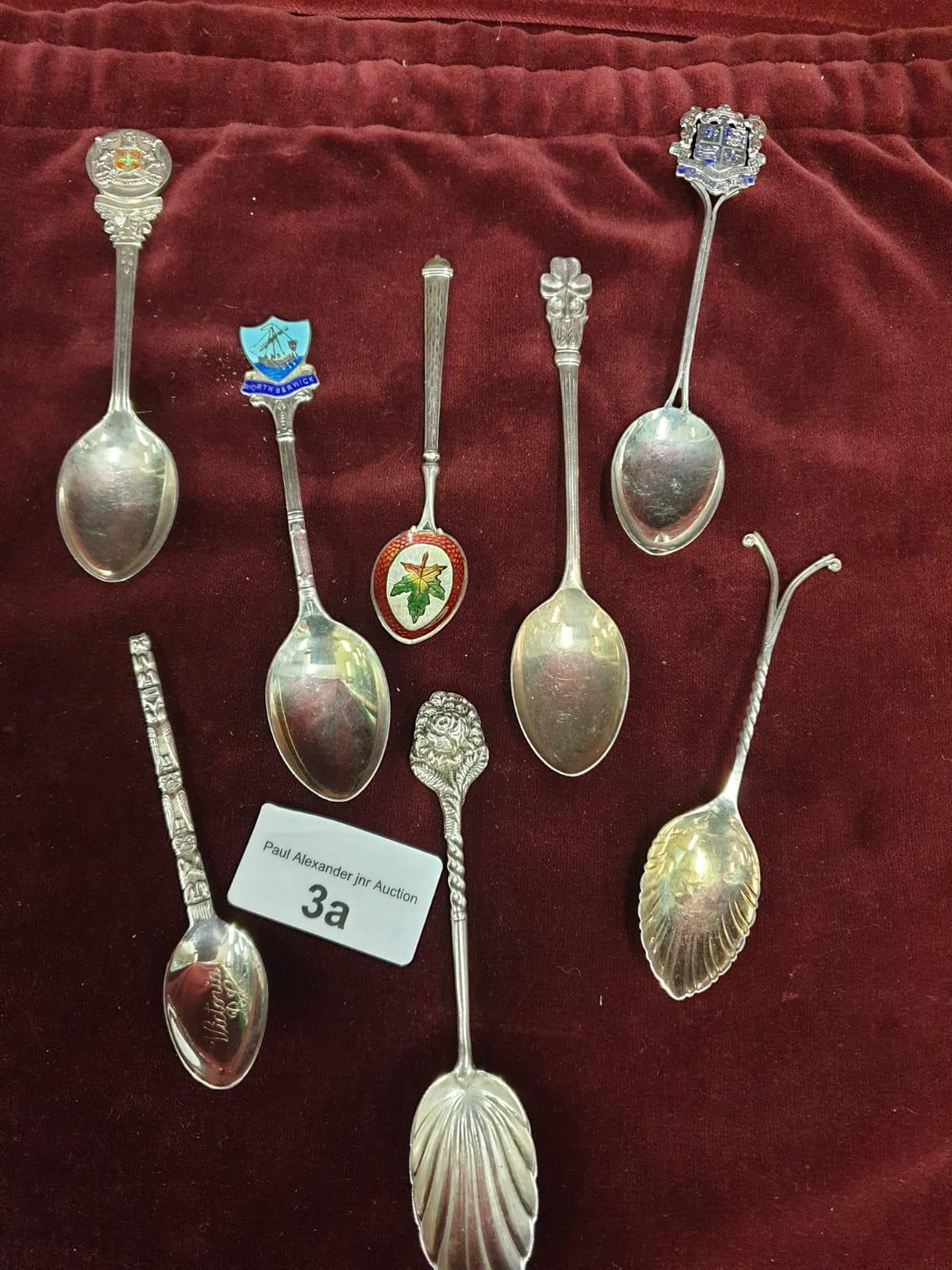 Selection of silver Hall marked enamel spoons etc. 98 grams.