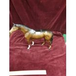 Large Beswick brown horse figure.