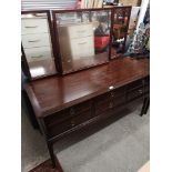 Stag 6 Drawer Dressing table . mirror in centre needs attention .