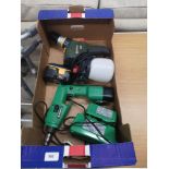 Box of power tools includes ryobi drill.