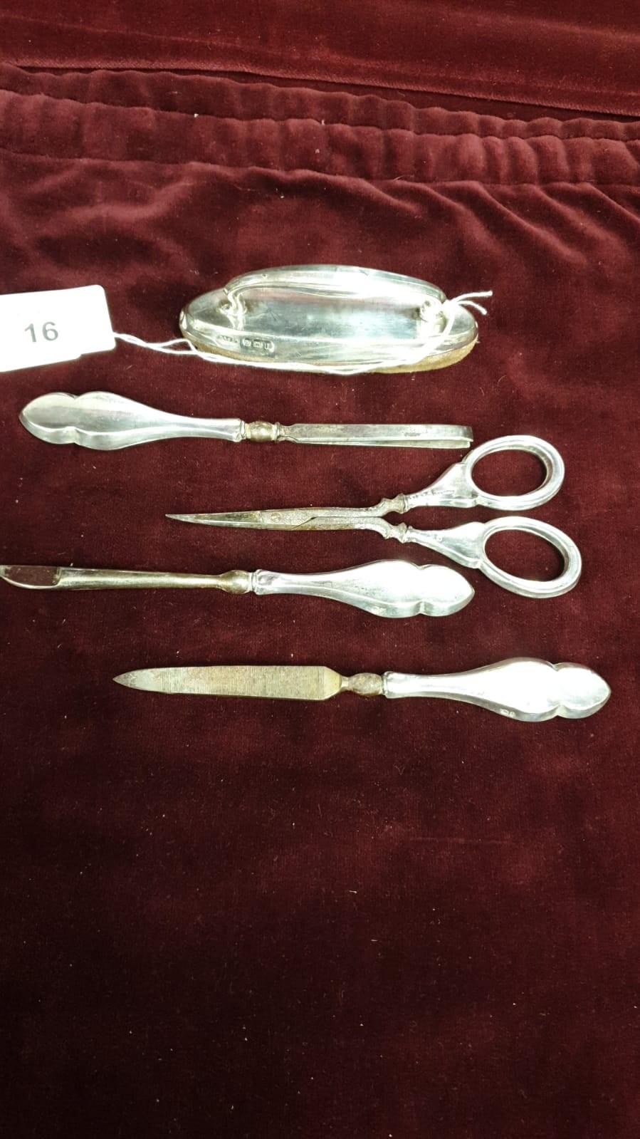 Silver Hall marked manicure set with rare silver handled scissors.