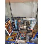 Shelf of playstation 2 games.