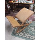 Leather topped rocking stool.