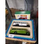 Boxed corgi double bus set together with other corgi schwepps advertising bus model.