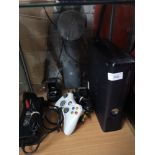 Xbox 360 slim console with controller.