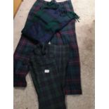2 pairs of tartan trousers together with tartan scarf.