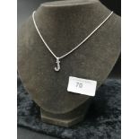 Silver Necklace with J letter pendant .