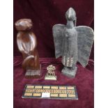 Carved stoat figure, carved tribal style bird figure together with inlaid game. The brass / bronze