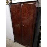 Stag Minstrel 2 Door wardrobe with fitted shelving .