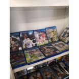 Shelf of playstation 4 games .
