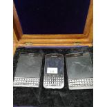 3 Blackberry mobile phones .