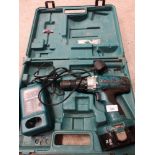 Makita drill with charger boxed.