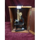 1900s R & J beck microscope in fitted wooden.
