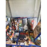 Shelf of playstation 2 games.