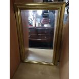 Gilt frame mirror .