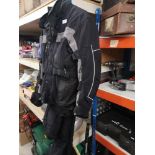 Motorbike jacket with two pairs of trousers size 48 jacket.