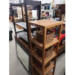 2 Storage shelving units with baskets .