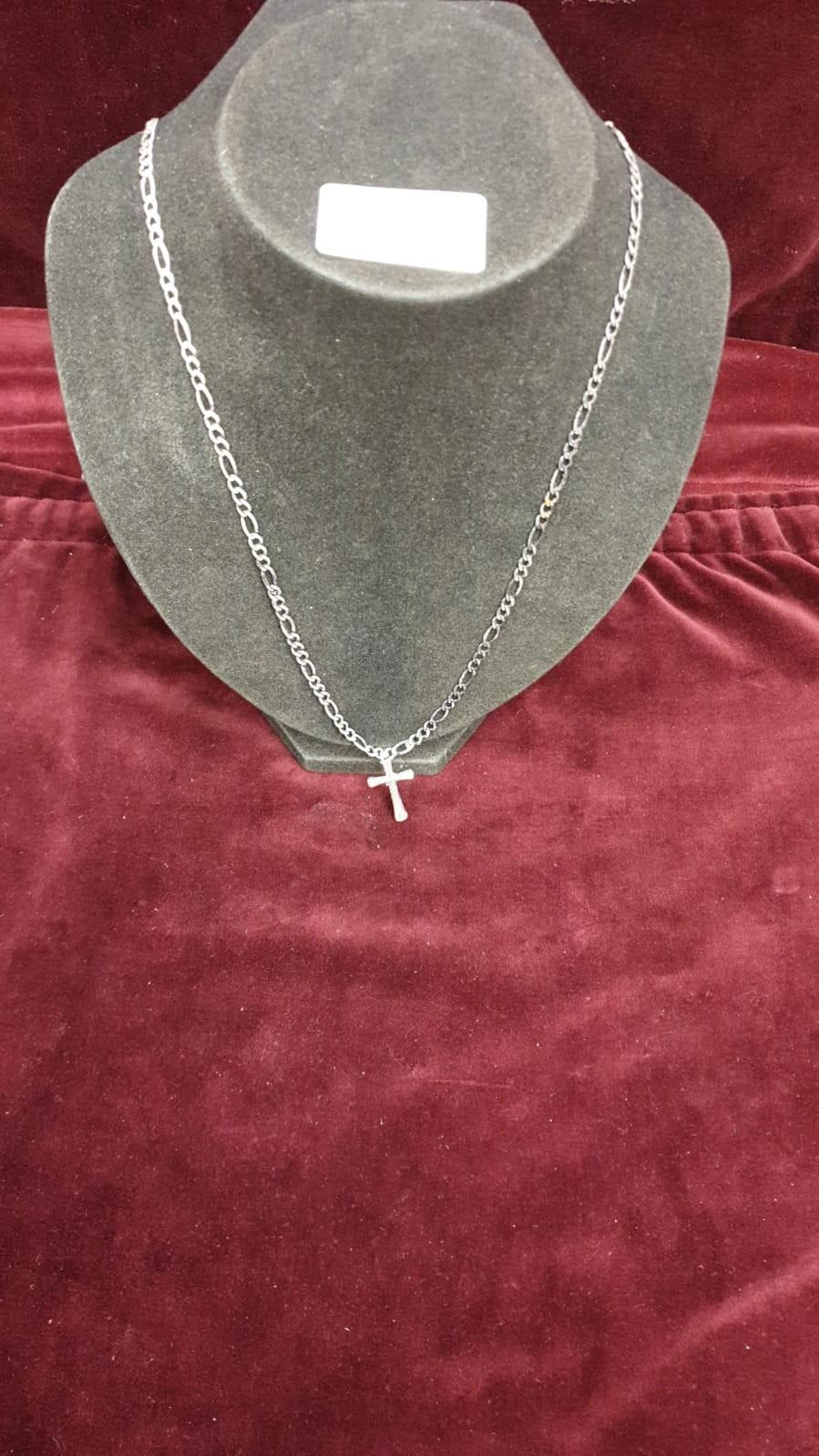 Silver 24 inch figaro chain with cross.