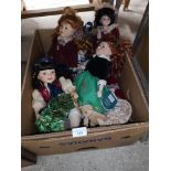 Box of porcelain dolls.