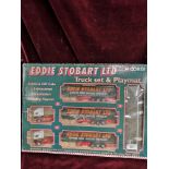 Boxed Corgi Eddie Stobart truck set with play mat .