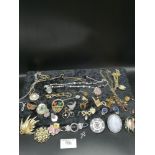 Lot of Jewellery to include brooches etc .