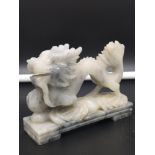 Heavy Oriental dragon figure set in soap stone..