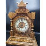 Sonia clock Co New York USA light oak mantle dated 18th June 1882 with pendulum.