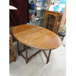 Oak barley twist legged drop leaf table..