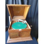 Vintage Gramaphone in light oak casing .working order .