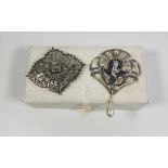 2 decorative Silver brooches includes 1 signed Hollywood brooch with box.