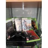 Xbox 360 console with power supply and games and controller.