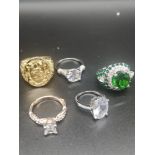 Lot of rings to include large silver green and clear stone stunning ring.
