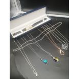 Lot of necklaces to include silver necklaces together with boxed watch.