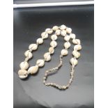 Eastern statement shell necklace.