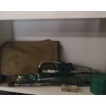 Shelf of fishing bag rod etc.