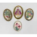 Collection of 4 detailed vintage embroidered brooches.