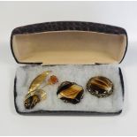 3 stunning vintage gold metal brooches that include 2 Tigers Eye art glass brooches.
