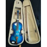 Quality blue violin in fitted case.