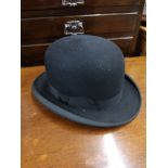 Size 7 superior bowler hat.